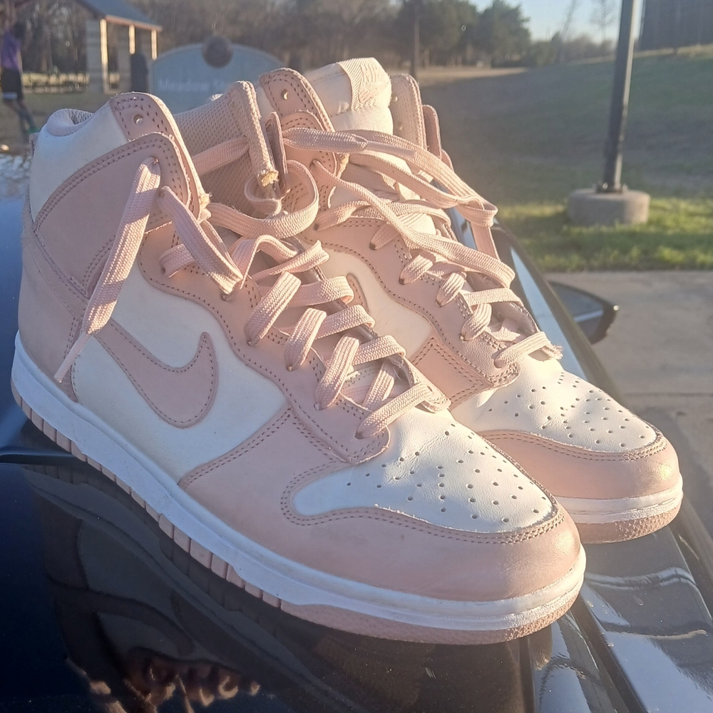 Worn Nike Dunk Women's Pink and White Sneakers
